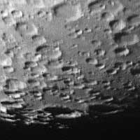 Manzinus and Mutus craters at the bottom